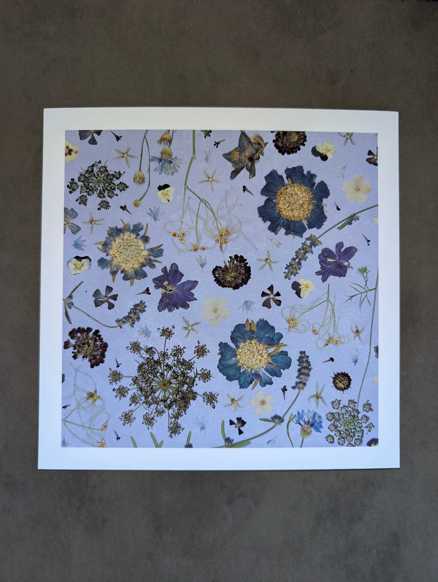 Floral patterned paper on a dark background